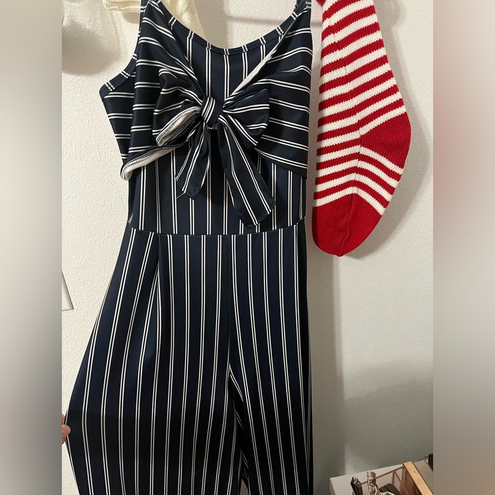 Navy blue and white jumpsuit size large.